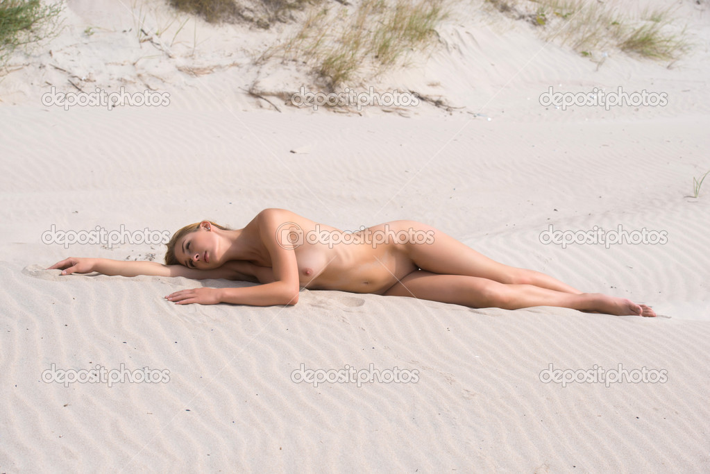 stock photo young naked woman sunbathing stock photo young naked woman sunbathing