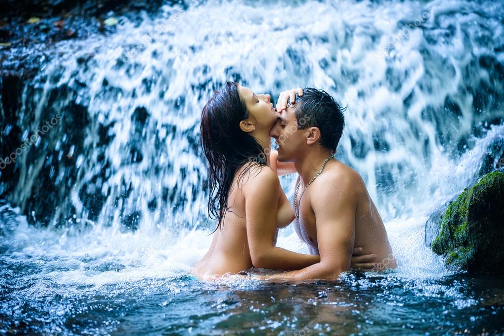 http://stn.depositphotos.com/1004114/1327/i/950/depositphotos_13276857-Couple-hugging-and-kissing-under-waterfall.jpg